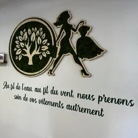 enseigne murale pressing delle